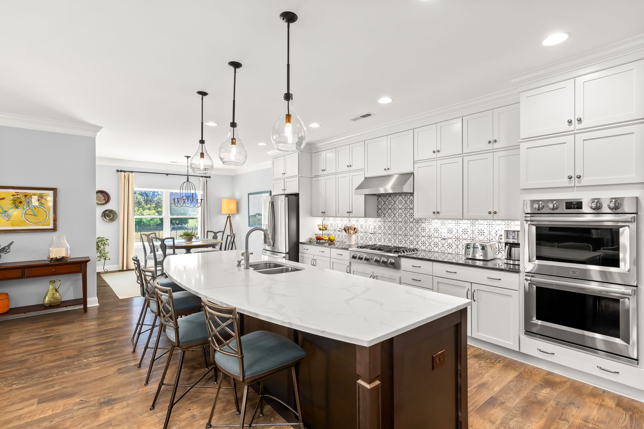 Chef's kitchen with double oven and gas range